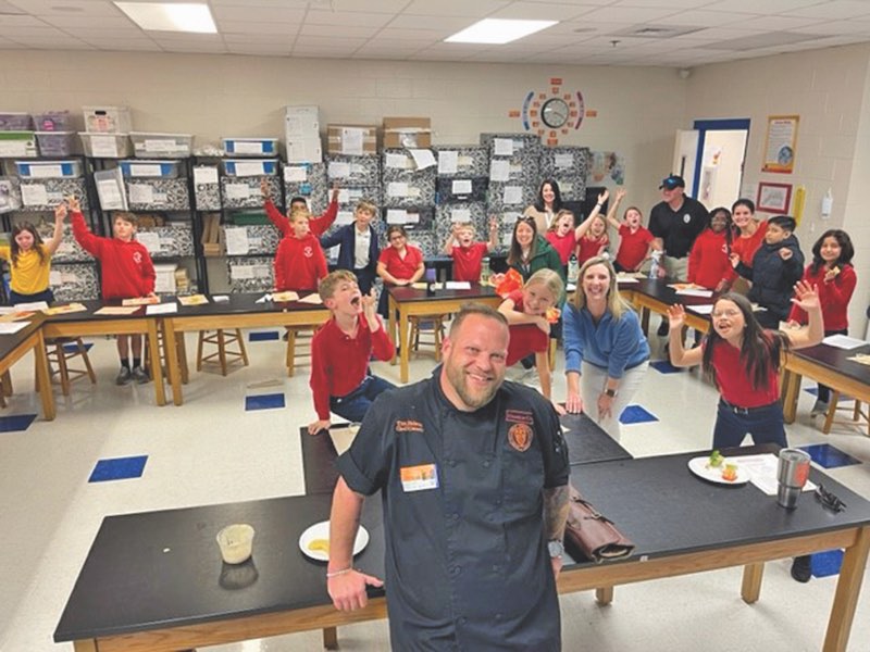 chef Tim Nelson from CharBar and Holy Tequila restaurants on Hilton Head at school with kids