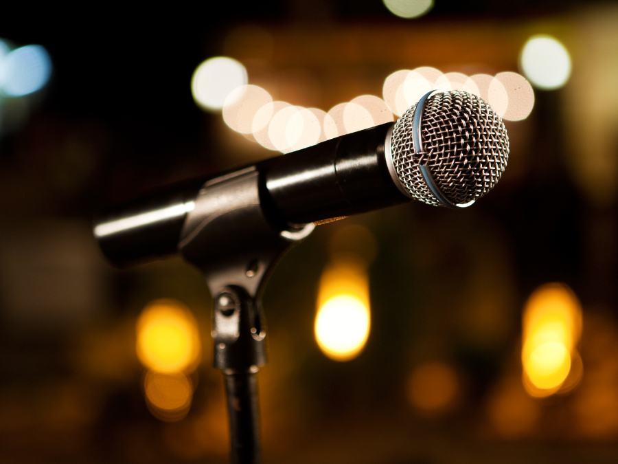 Microphone with blurred sparkled lights in background
