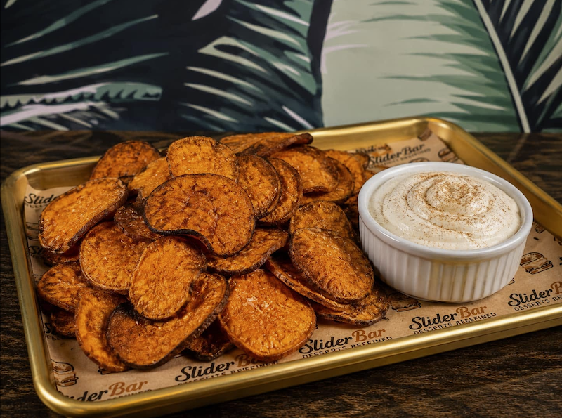 Crisp house-made sweet potato chips paired with a fluffy marshmallow dip
