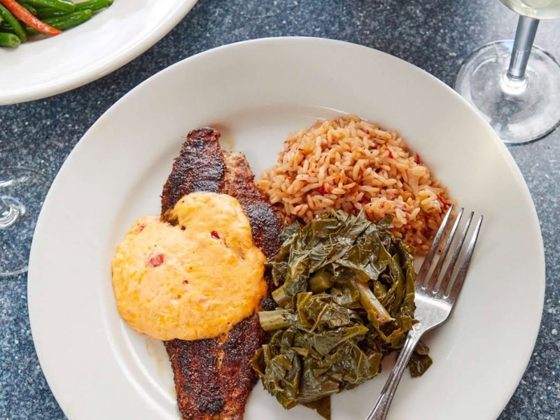 Blackened Carolina catfish with pimento cheese, Savannah red rice and collard greens