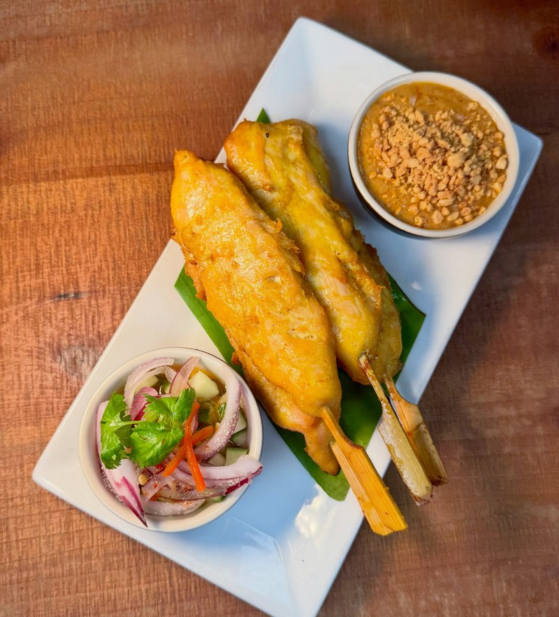 Thai Smile Cuisine - favorite chicken satay marinates