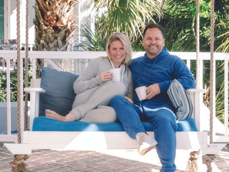 Couple Swinging on porch swing in the morning