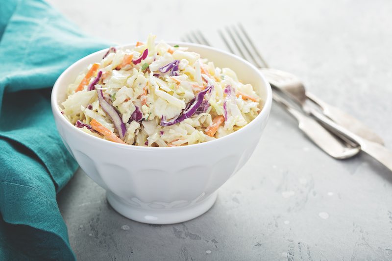 Traditional cole slaw salad in a white bowl