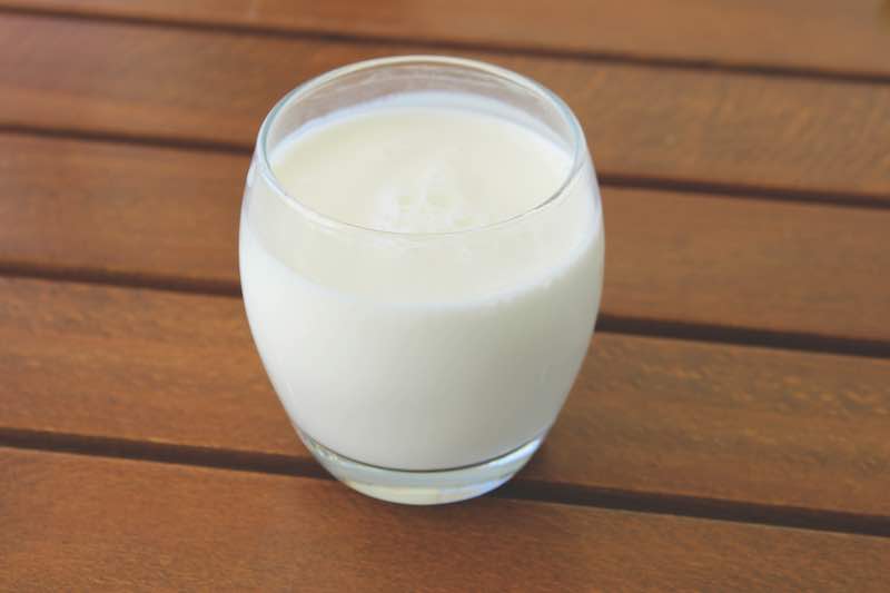 Kefir in a glass cup, fresh milky drink