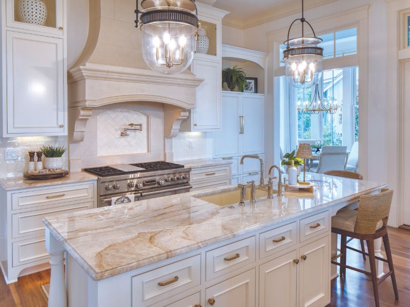 Neutral kitchen with island, sink and stove