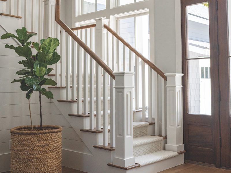 Foyer with staircase and big planter