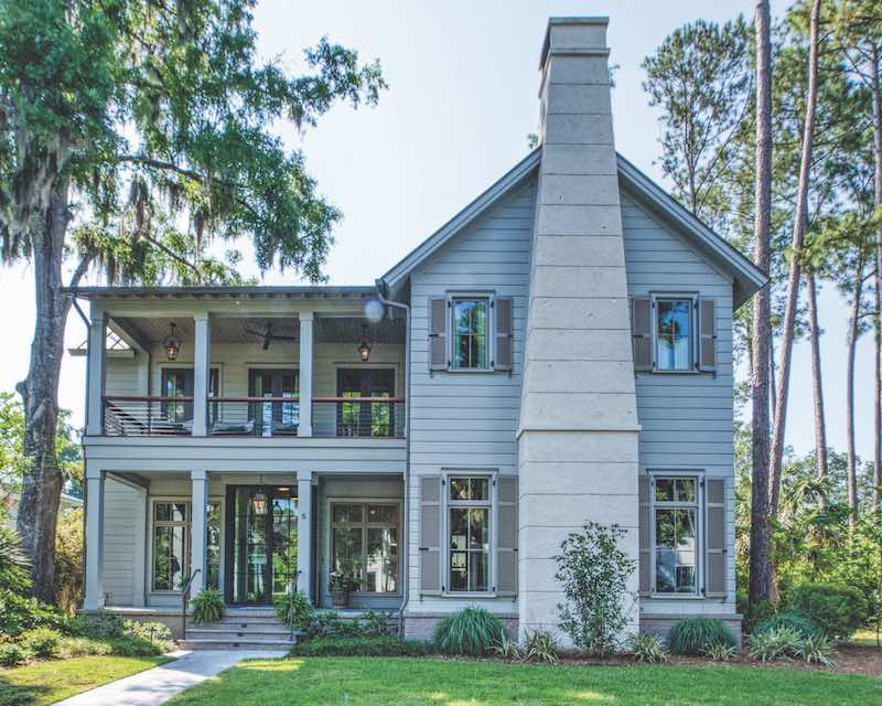 Exterior of a home with lush greenery outside