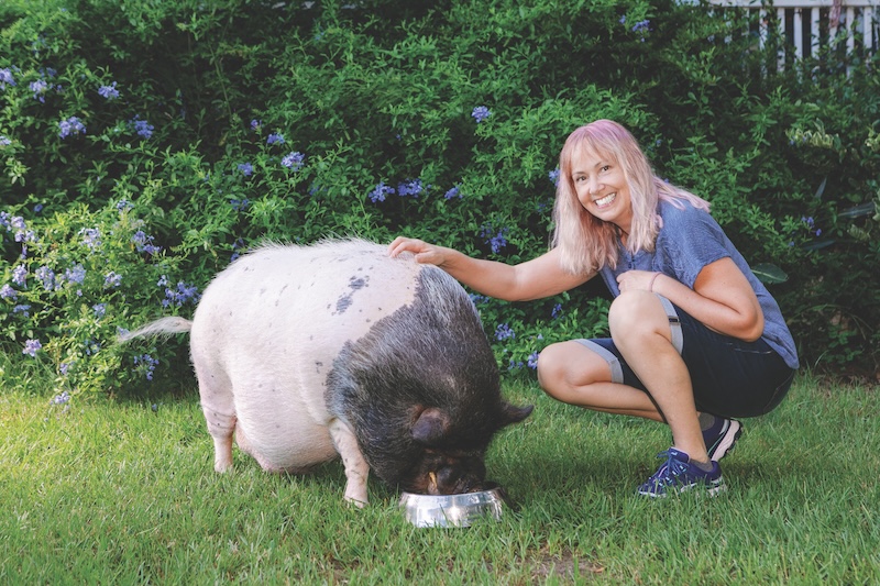 Victoria Rapolti with her pet pig