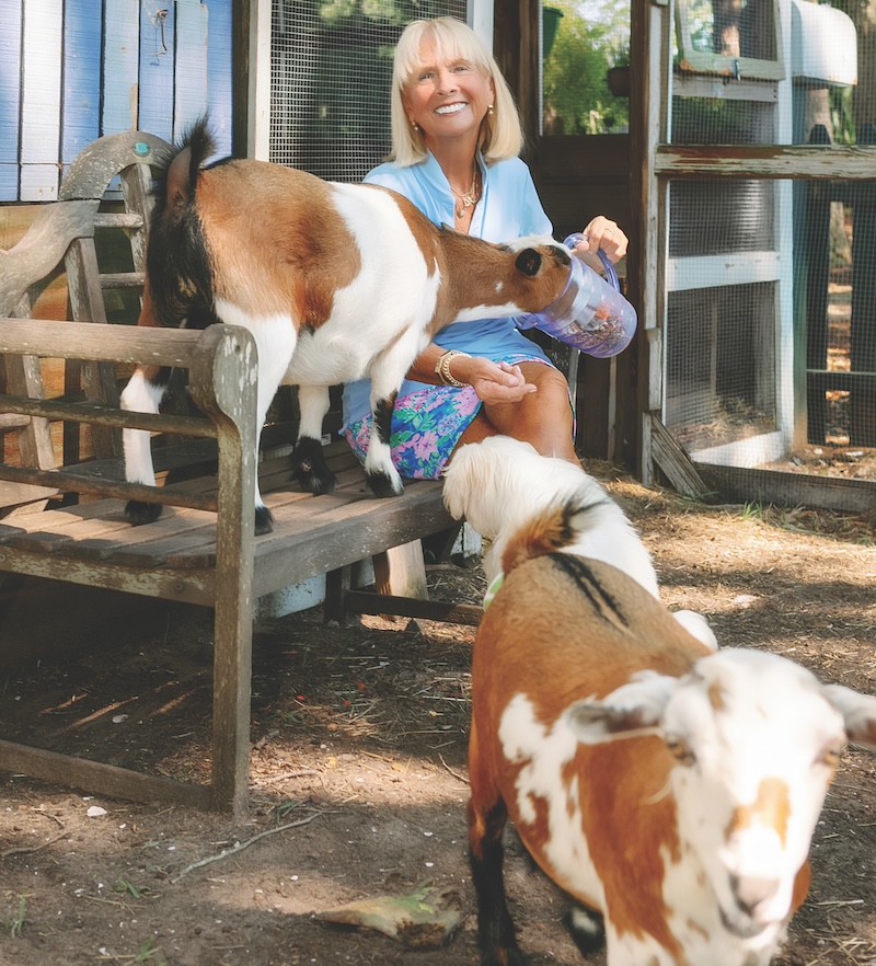 Debi Lynes with Goats