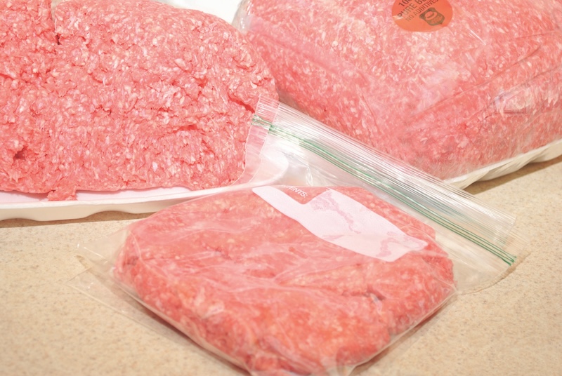 Purchased Bulk Hamburger Being Devided in Freezer Bags