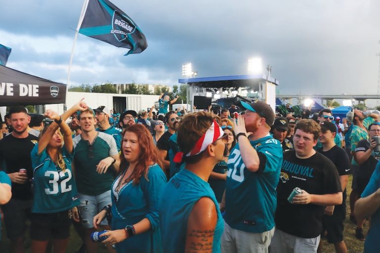 A crowd of people tailgating at Jacksonville Jaguars