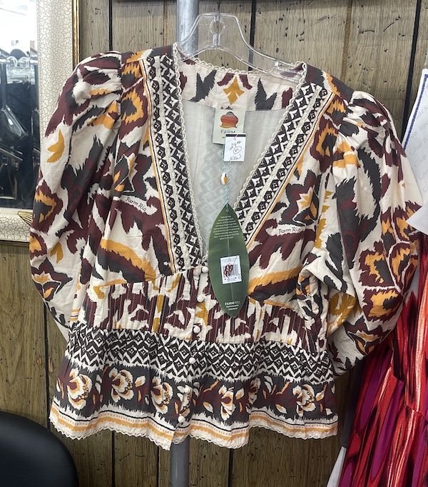 The Bargain Box's new-with-tags Farm Rio top in deep greens and reds.