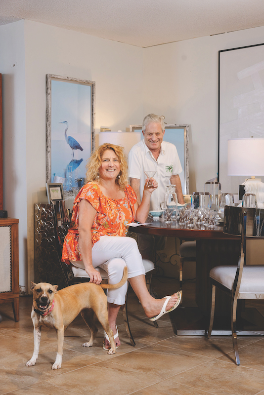 Marda Gunning and Michael Shanley pose in Michael and Co. Antiques
