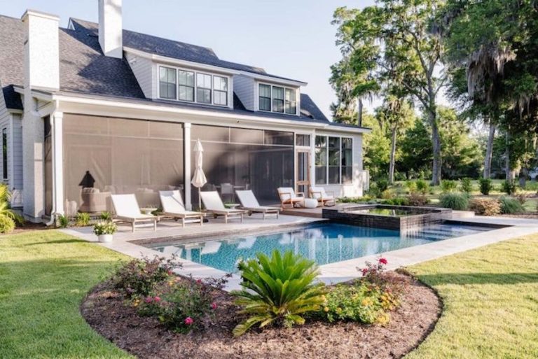 Pool deck designed by Savannah Surfaces mixes and matches pavers