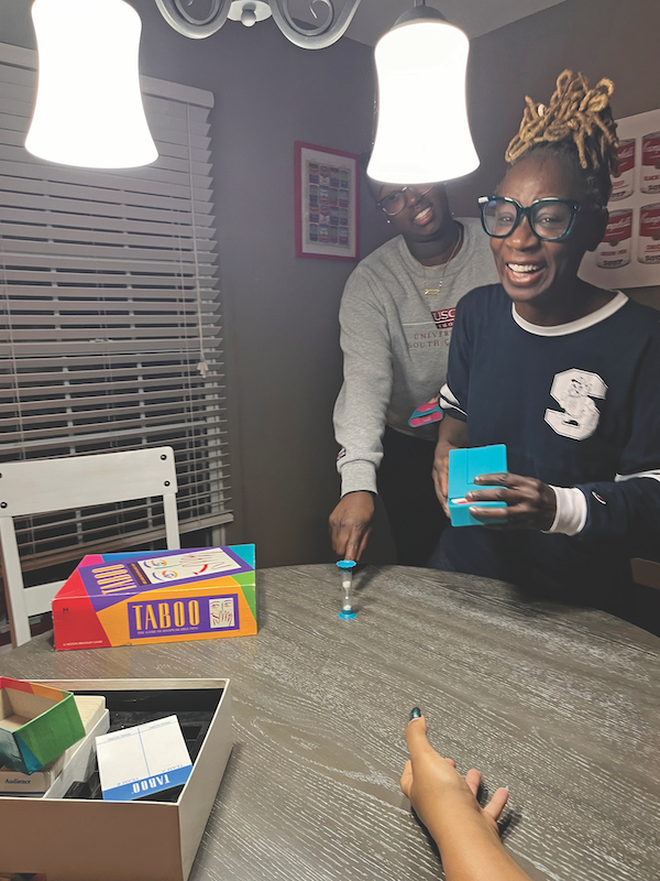 Campbell family playing Pictionary