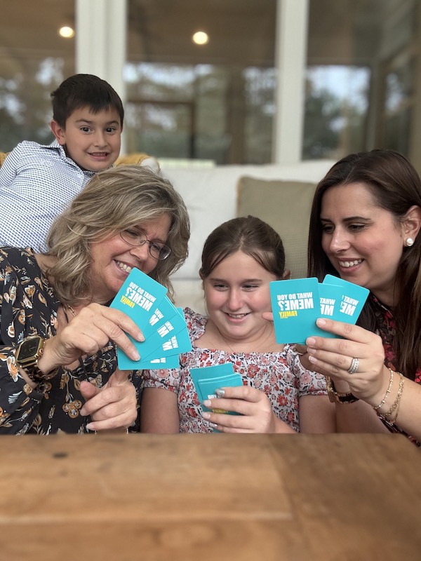 Davis family playing What Do You Meme Game.