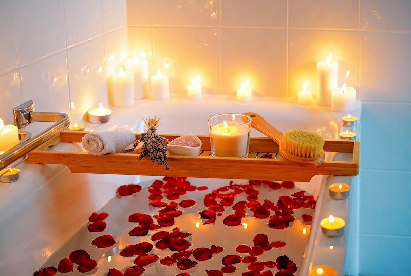 Serene bath with rose petals, lavender and candles