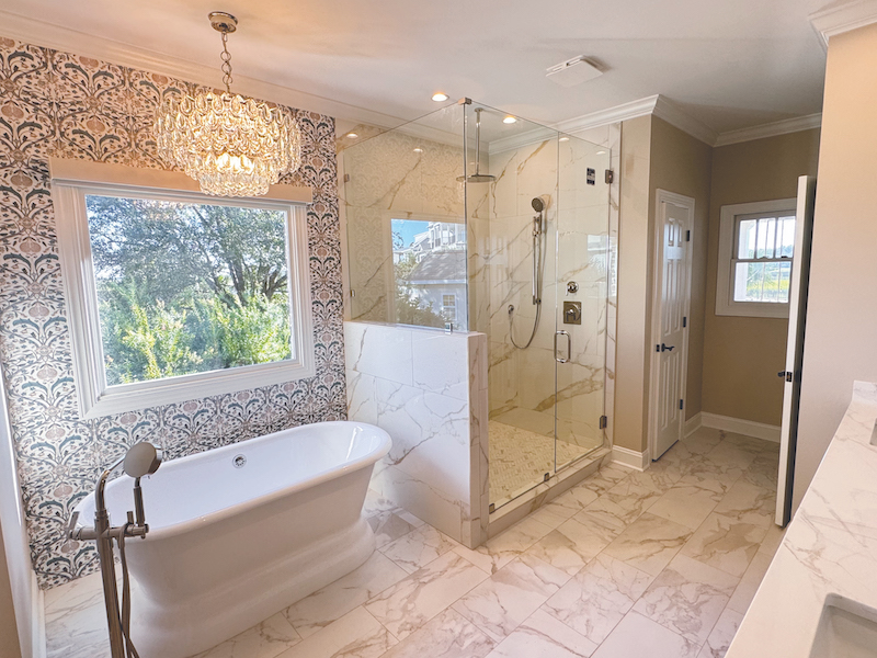 Master bathroom with polished nickel soaking tub hand painted marble coastal Richmond Hill