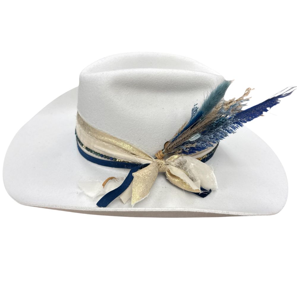 Brims on the Bluff updates its signature hat with dried florals and a ribbon tie