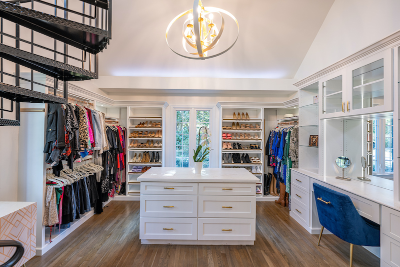 Custom walk-in closet Closet Factory spring 2026 design with center island and vanity