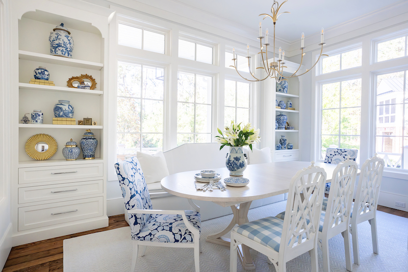 Light blue and white dining room in Palmetto Bluff home by Pearce Scott Architects