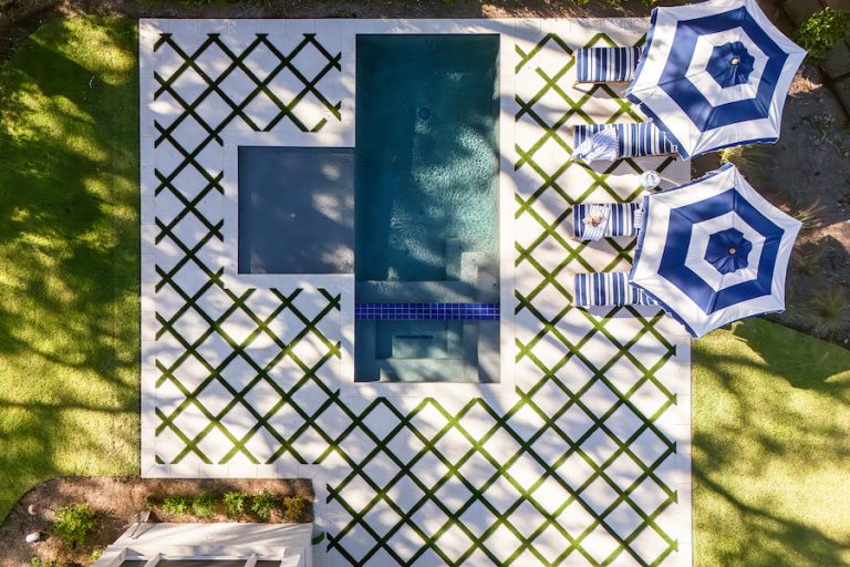 Overhead of paver pool in Palmetto Bluff home backyard by Pearce Scott Architects and Year Round Pool