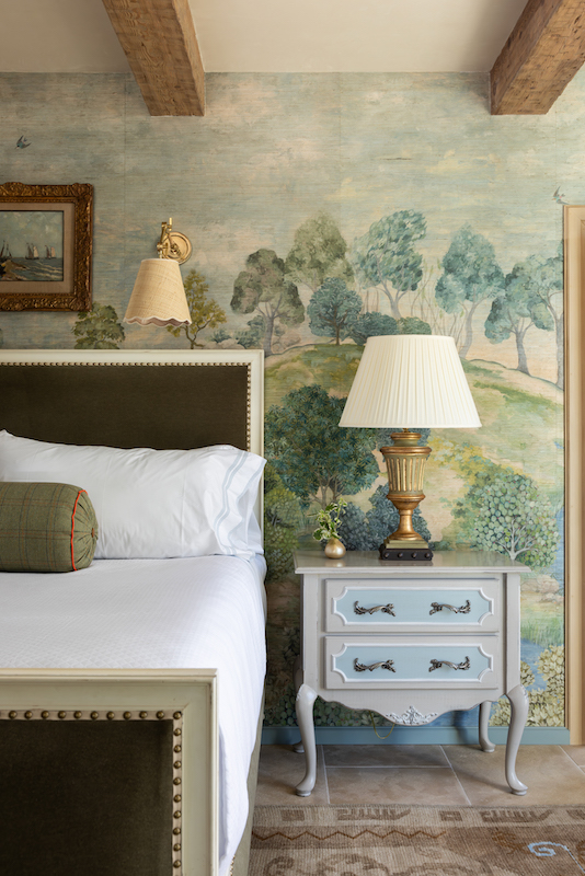 California home by J. Banks Design with mural wallpaper of rolling hills scenery bedroom