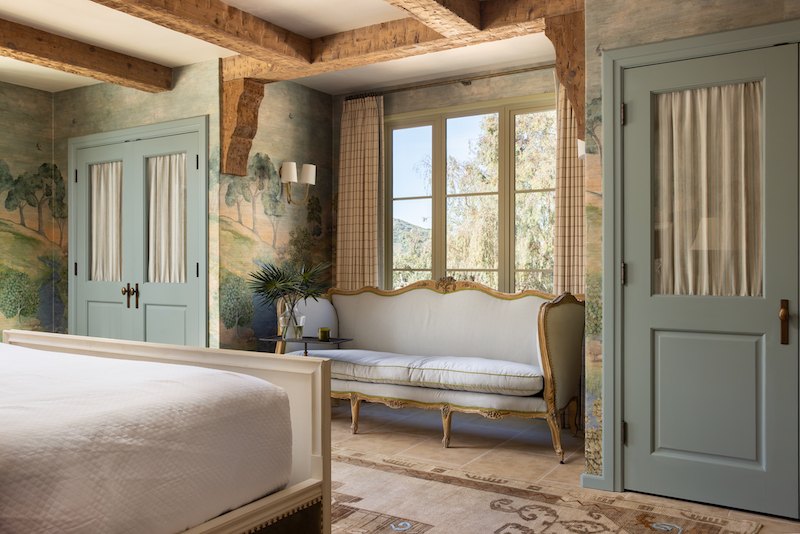California home by J. Banks Design with mural wallpaper of rolling hills scenery view