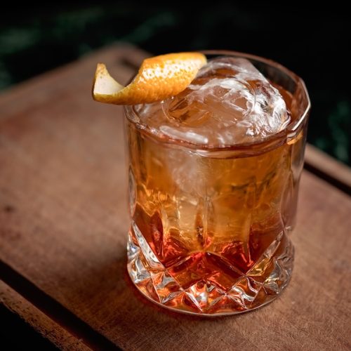 Old fashioned, classic cocktail served on the rocks