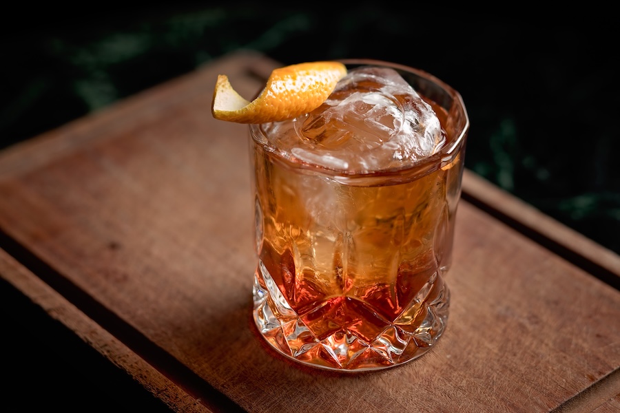 Old fashioned, classic cocktail served on the rocks