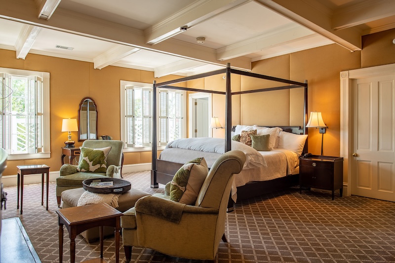 Refined guest room at The Willcox with elegant decor and neutral tones