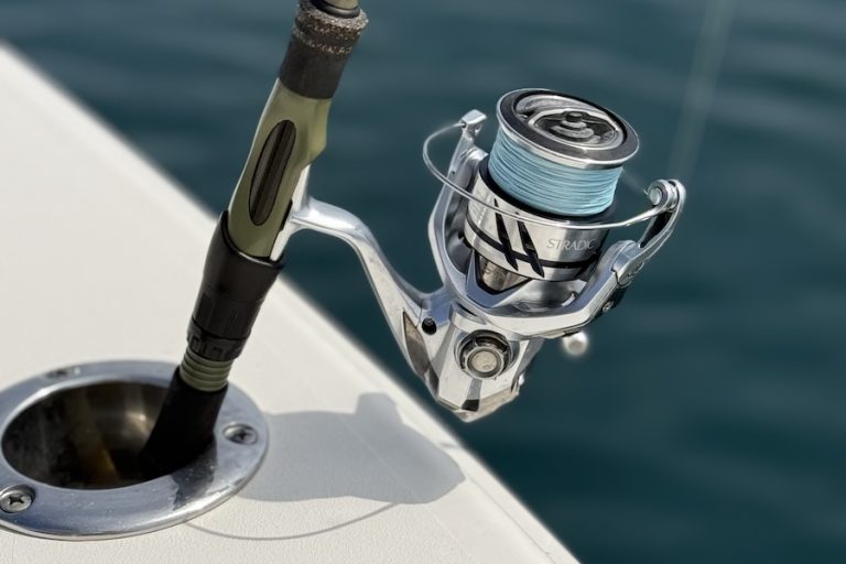 Bull Bay Banshee spinning rod with Shimano Stradic reel on boat