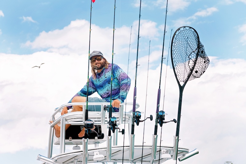 Capt. Kai Williams aboard fishing charter boat