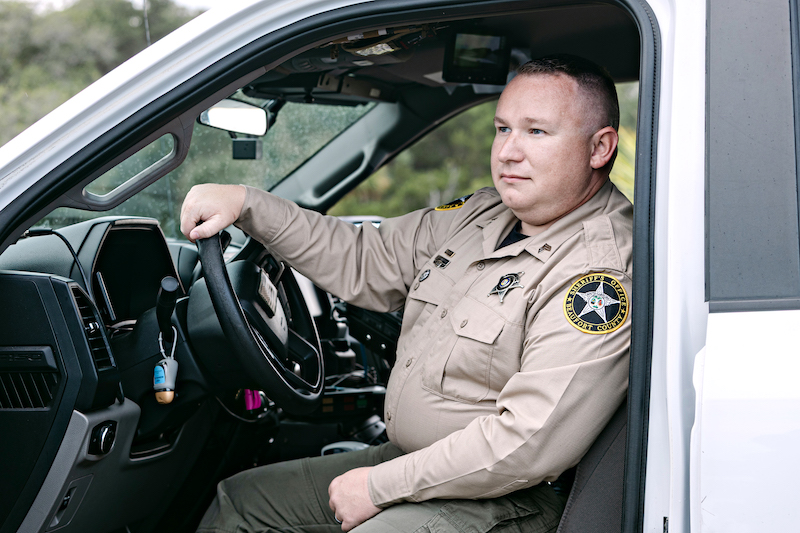 Cpl Christian Anderson Beaufort County Sherrif's Office Special Enforcement Unit in police vehicle