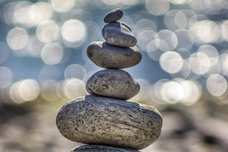 Stacked balancing stones symbolizing meditation mindfulness and emotional balance