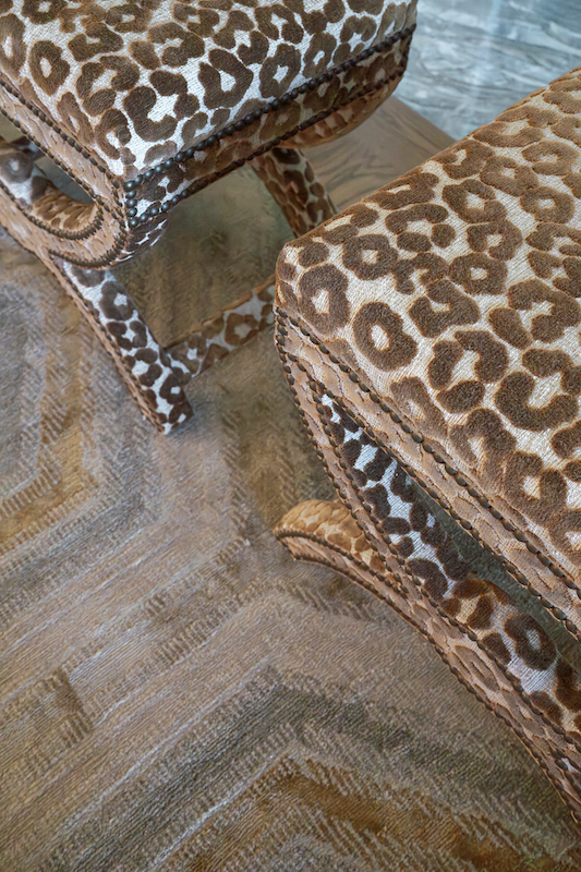 cheetah print stools in elegant Palmetto Bluff home by Kelly Caron Designs