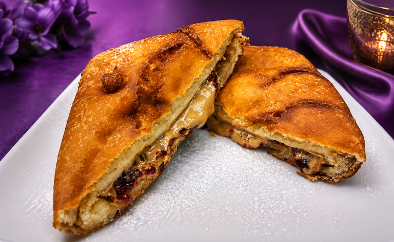 Golden fried peanut butter and jelly sandwich dusted with powdered sugar from The Purple Cow.