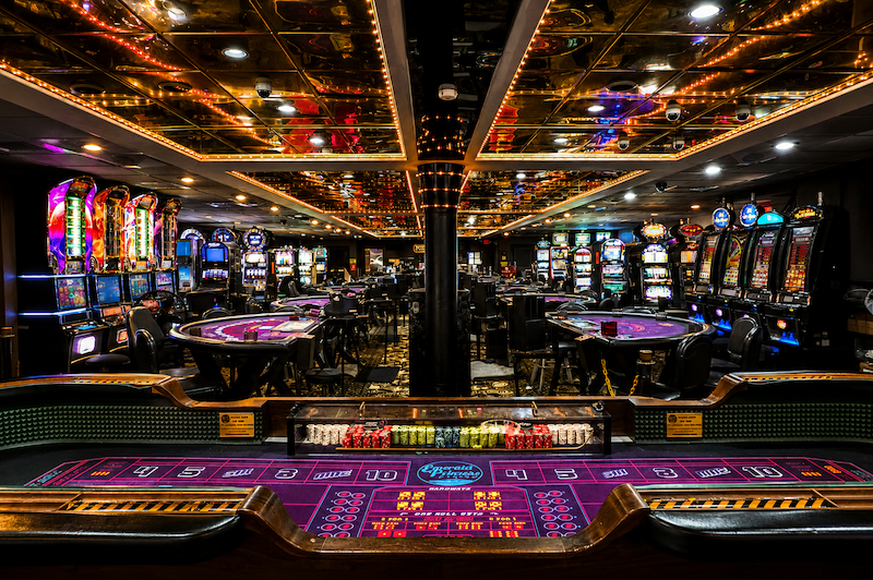 Gaming tables and slot machines aboard Emerald Princess II Casino