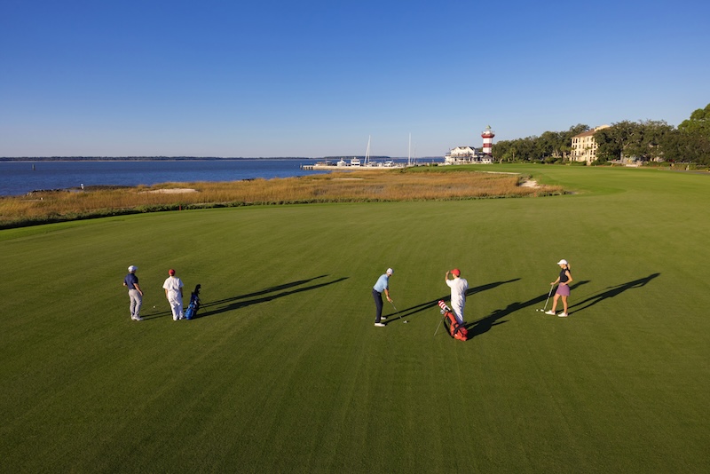 Friends playing golf at Harbour Town Golf Links on Hilton Head Island.