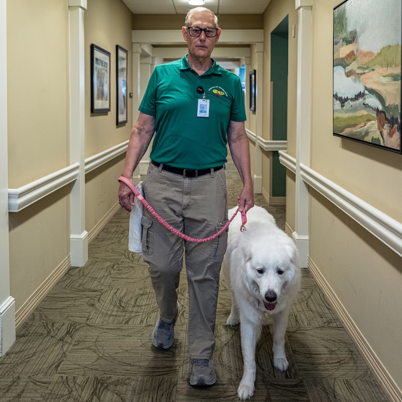 Therapy dogs Sarah and Toby with owner Mikel Peeler before visiting hospitals and healthcare facilities across the Lowcountry.