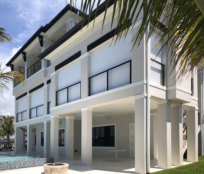 Motorized shutters hurricane window treatment protection