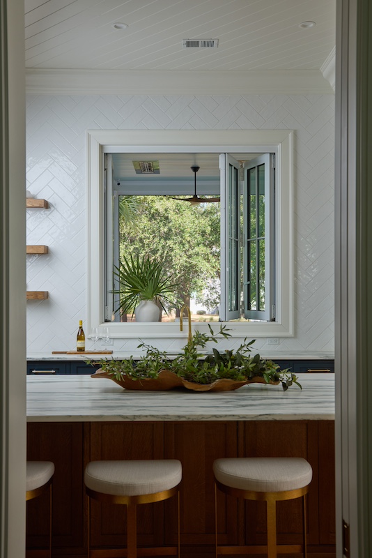 Palmetto Bluff home by Front Light Building Company and Iris and Oak Interiors kitchen island bar seating