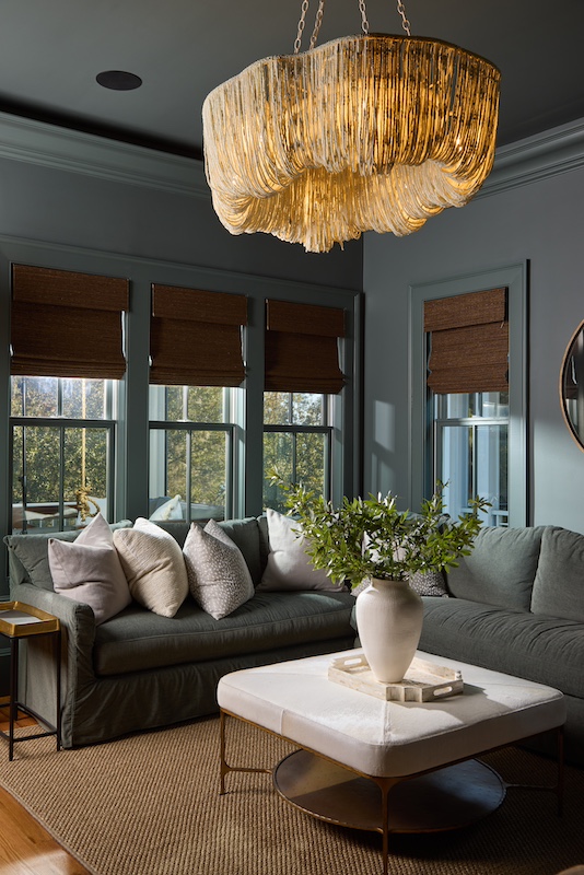 Palmetto Bluff home by Front Light Building Company and Iris and Oak Interiors living room chandelier