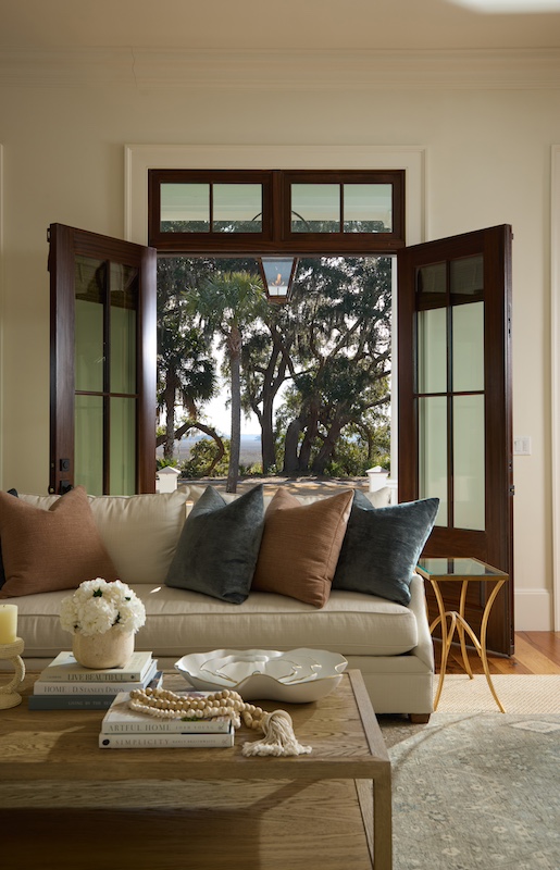 Palmetto Bluff home by Front Light Building Company and Iris and Oak Interiors living room exterior doorway