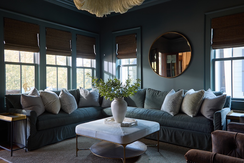 Palmetto Bluff home by Front Light Building Company and Iris and Oak Interiors moody living room