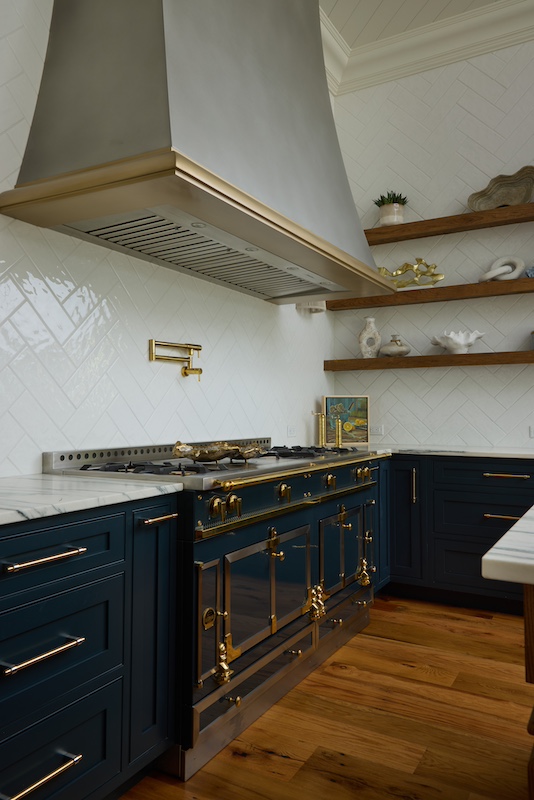 Palmetto Bluff home by Front Light Building Company and Iris and Oak Interiors stove and hood