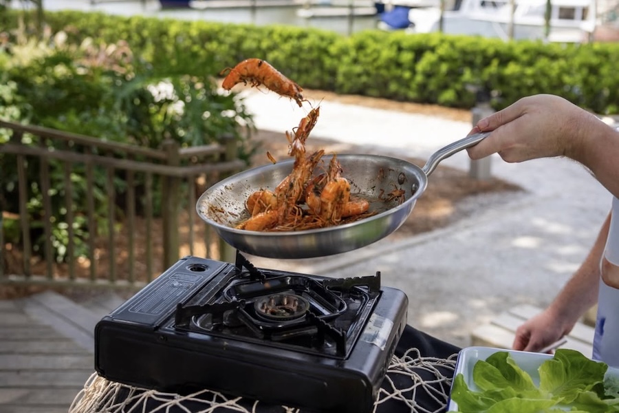 Fresh Lowcountry shrimp being cooked outdoors near Harbour Town on Hilton Head Island.
