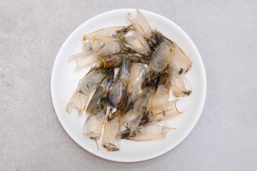 Raw shrimp shells saved for making homemade shrimp stock, shrimp oil and other kitchen staples.