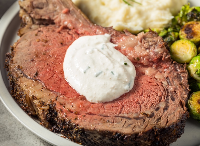 Prime rib served with creamy homemade horseradish sauce.