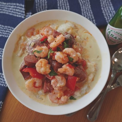 Lowcountry shrimp and grits with local shrimp, smoked sausage, peppers and spicy hot pepper cream sauce.